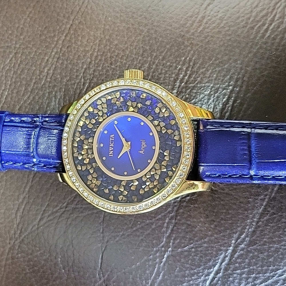 Invicta Angel wristwatch yellow gold tone case blue MOP face and leather band